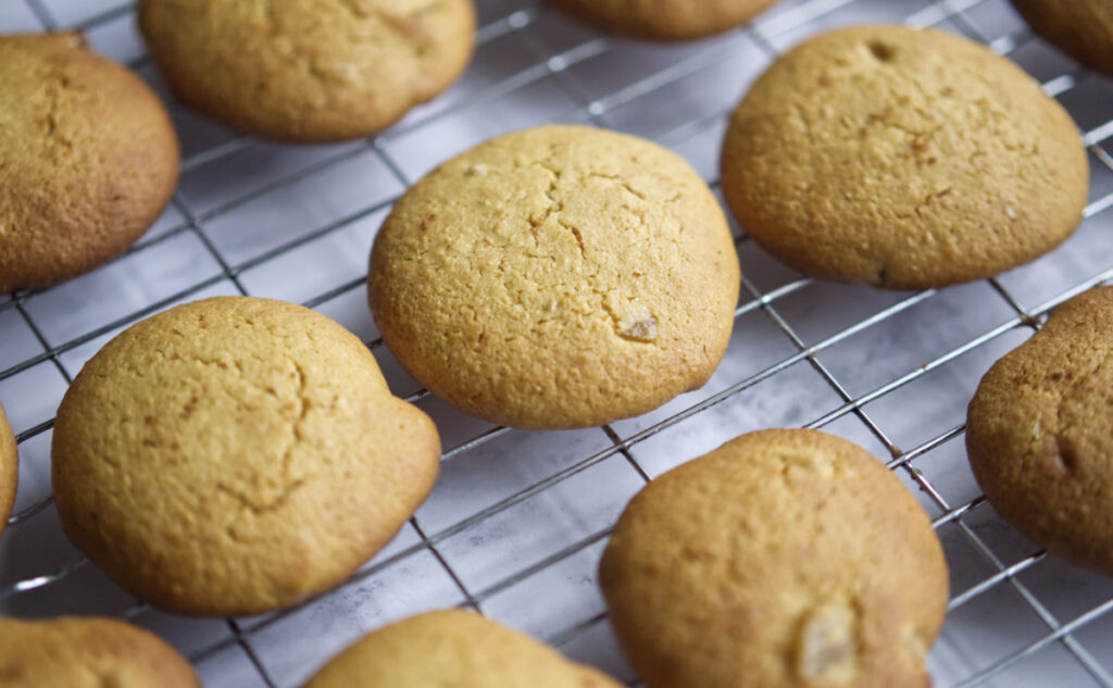 Double ginger cookies on a cooling rack